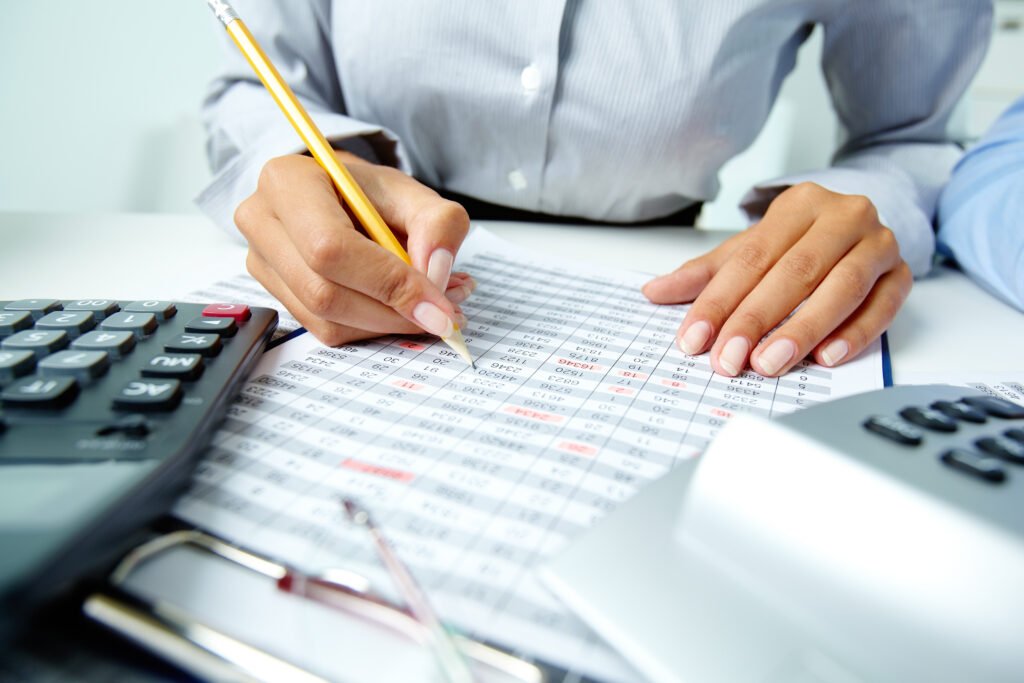 Tax Document and Round Clock on the Table