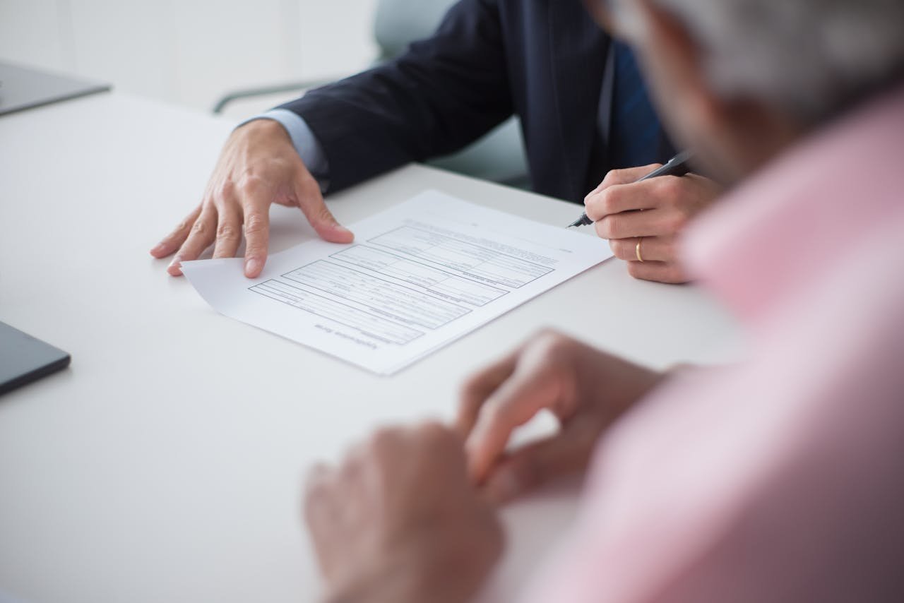Elegant Man Signing Documents
